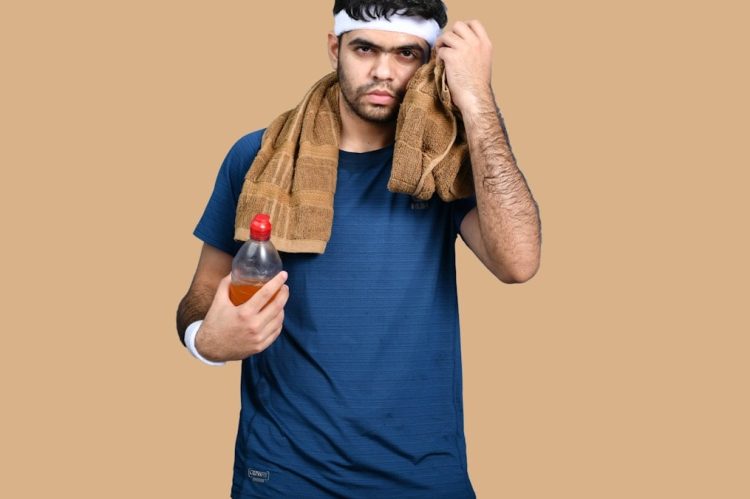 a person holding a bottle